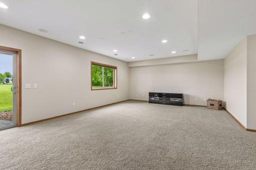 Open spacious lower level. You have a walk-out to your backyard. Plenty of options for seating and use options.