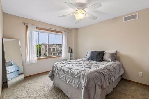 Second bedroom that is on the upper level. Very spacious. There is a walk-in closet in this bedroom as well.