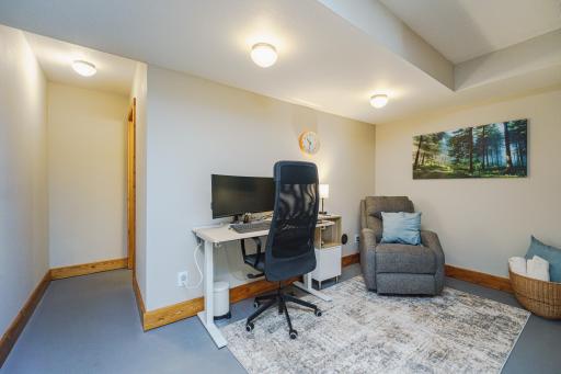 The family room opens to a flex space/study nook, with new trim and fresh paint.