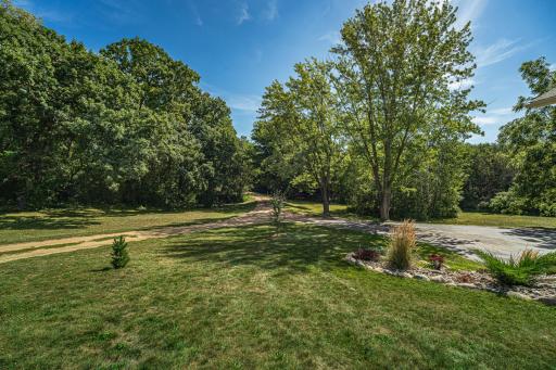The driveway coming in to the homesite. The landscaping around the home is all new.