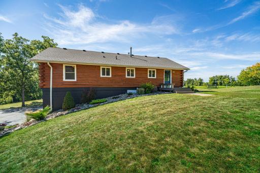 The log exterior was professionally sandblasted, chinked and re-stained (Summer 2000), and the paint and exterior lighting is all fresh.
