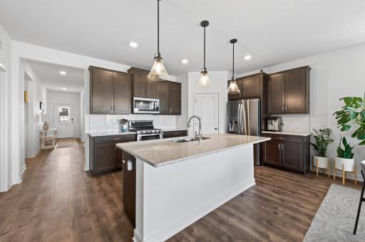 Recessed lighting and tile backsplash