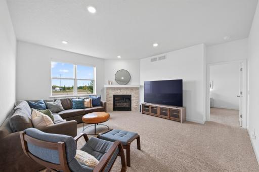 Spacious living room with recessed lighting