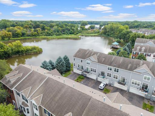 End-unit. Pond setting. Perfection! Beautifully maintained and move-in ready, this townhome offers an incredible setting with peaceful pond views.
