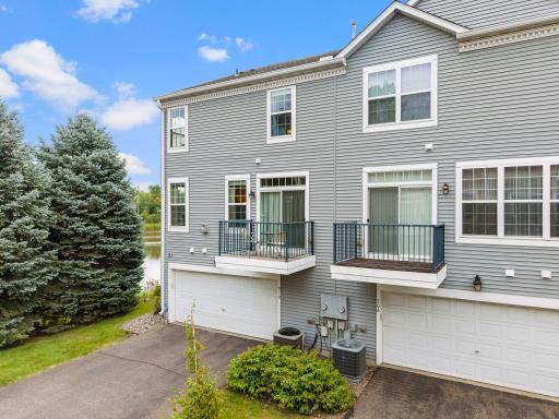 End unit. Two car garage and deck space.