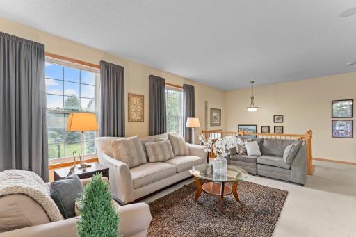 High ceiling create a warm and welcoming atmosphere. Neutral carpeting and paint makes this one move-in ready.