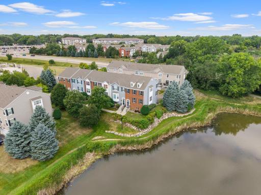 Wow! Great end-unit with pond setting. End-unit. Perfection! Beautifully maintained and move-in ready, this townhome offers an incredible setting with peaceful pond views.