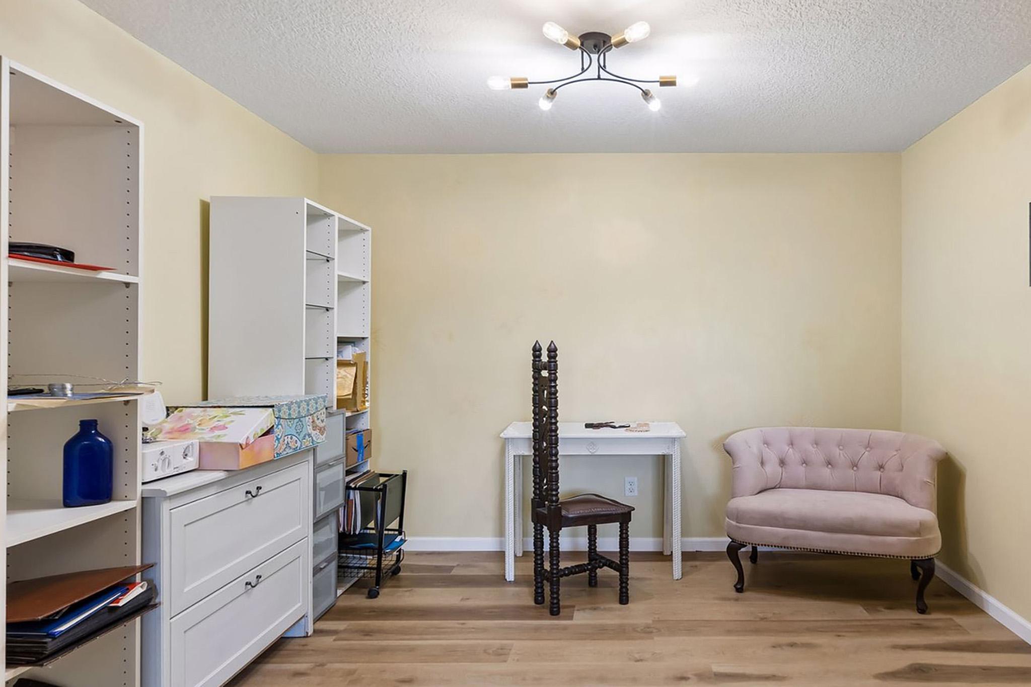 26. Flexible den space suitable for a 3rd bedroom, office, gym, or craft room.jpg