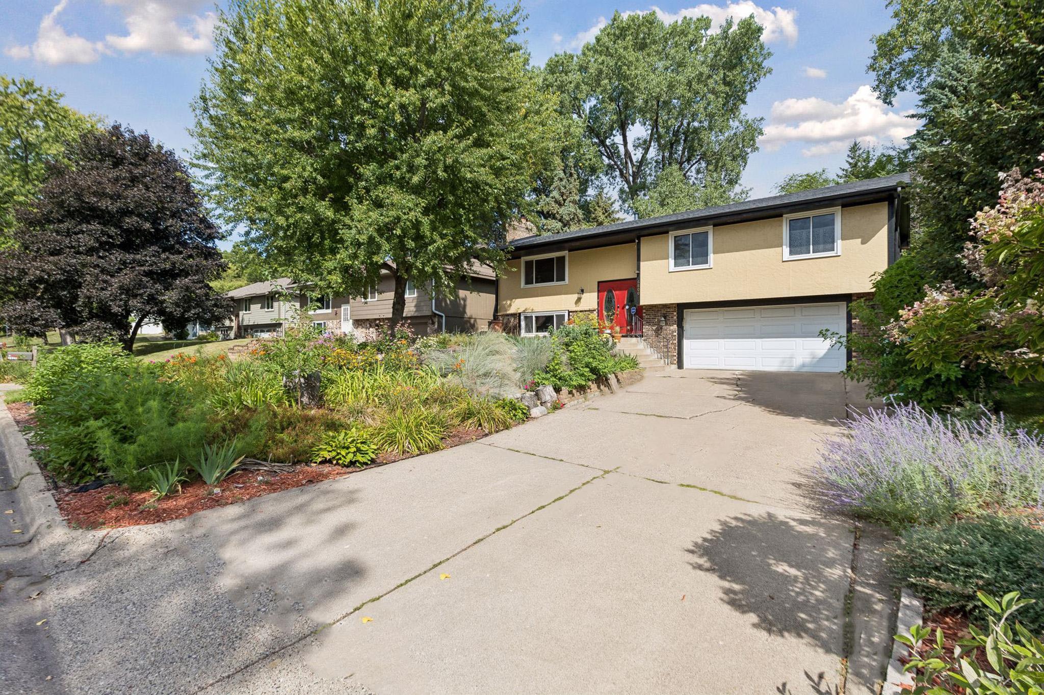8. Extra-wide driveway providing generous vehicle storage and easy access.jpg