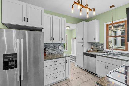 Gorgeous Granite Countertops & Stainless-Steel Appliances! A stylish combination that gives this updated kitchen a clean, modern look with plenty of workspace for cooking and entertaining.