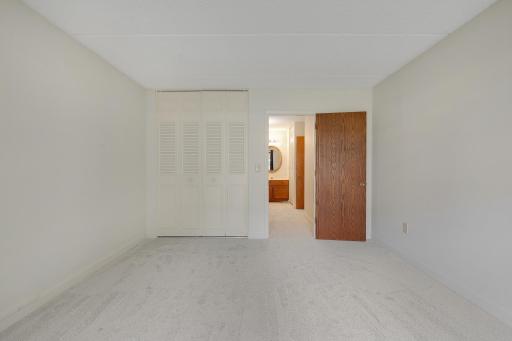 Bedroom has a walk-in closet and an additional closet.