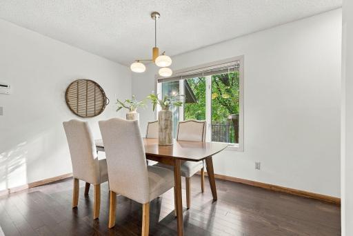 The dining room offers an easy setting for everyday meals or entertaining.