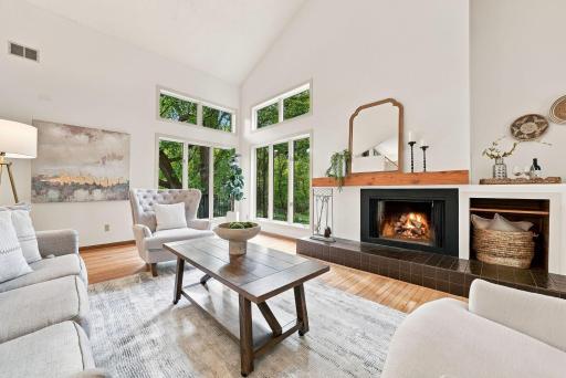 A light-filled living space designed around views of the surrounding greenery.