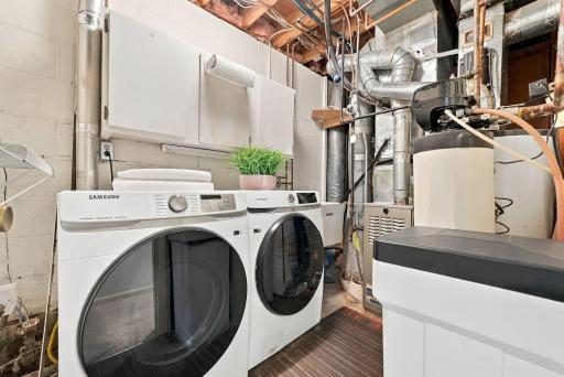 Convenient laundry and utility space keeps everyday needs organized.