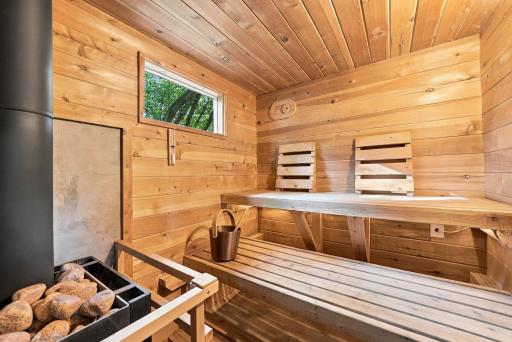 Warm wood interiors create an inviting sauna experience.