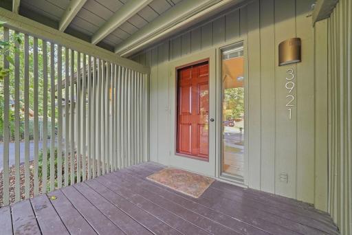 A covered front entry provides a welcoming transition into the home.