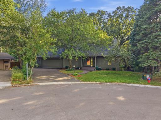 A private, tree-lined setting creates a beautiful first impression.