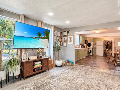 The living room floes nicely into the kitchen and dining area