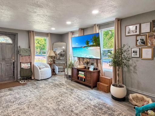 A nice and bright living space with recessed can lights for a modern feel
