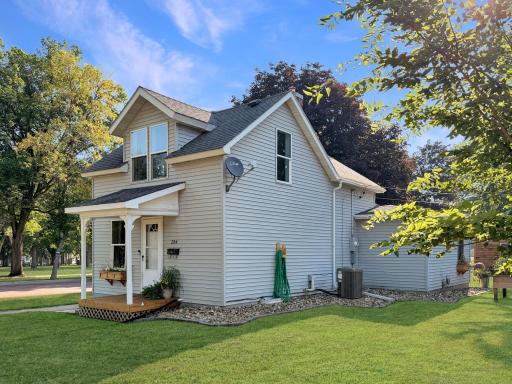 Vinyl siding with rock landscaping and updated central air