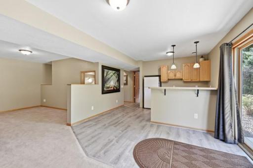Wet bar area & flex space ready for gaming, toys or crafts!