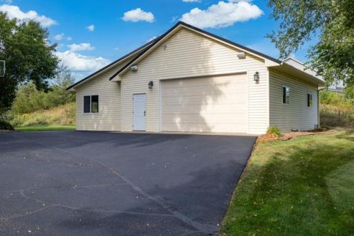 A must see finished, heated garage with storage & office space