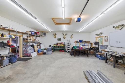 Heated, finished storage area with 9' garage door