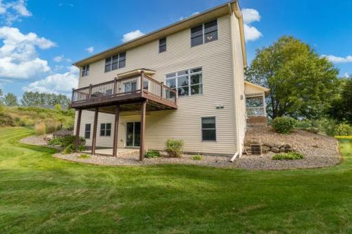 View of the back noticing the deck & walk out patio to hang out on!