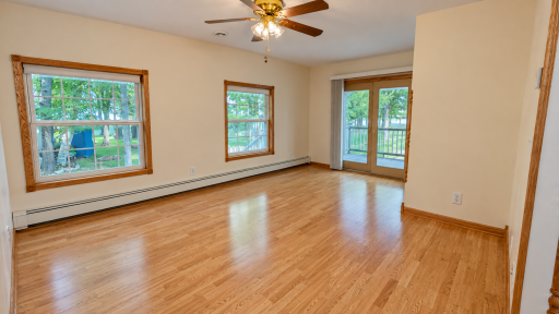living space off kitchen with lake view