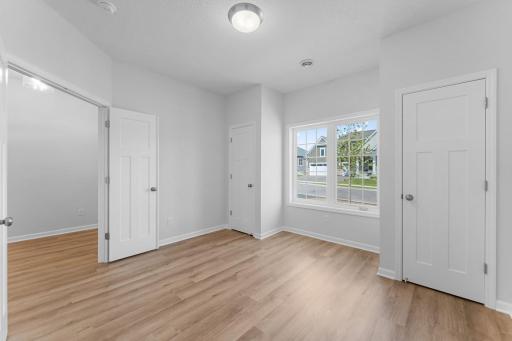 Located at the front of the home, the multi use secondary bedroom can be used as an office.