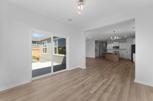 Convenient access to your patio through the slider door makes for easy entertaining.