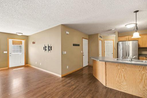 Off of the kitchen is the garage access, closet, 1/2 bath and utility room.