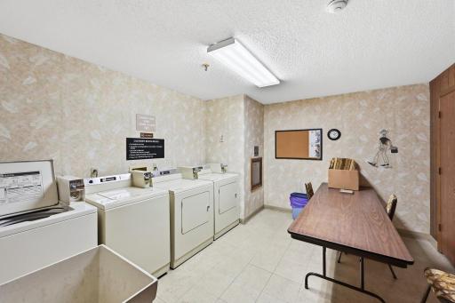 Down the hall from #210 is a coin operated laundry. This is intended to service those units that do not have in-unit washers and dryers.