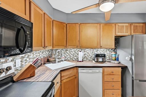 A close-up of the new maple cabinetry and appliances.