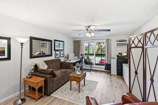 Another view of the nice sized living room. The wall AC unit was recently replaced.