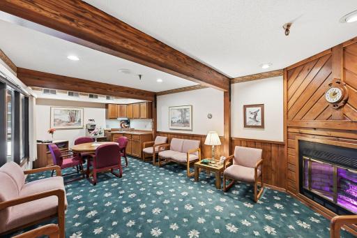 A community room is located on the main floor, and it has a fireplace and comfortable chairs for small group gatherings.