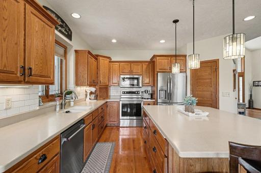 Ample cabinetry and a layout built for cooking and hosting, open to the dining area and great room.