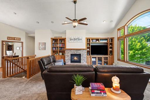 In-ceiling speakers and natural light throughout the vaulted great room on the main level.
