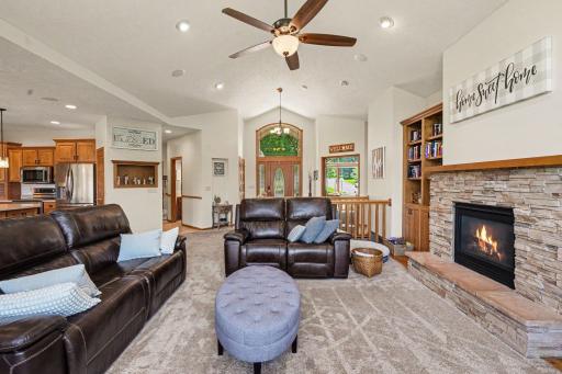 Open-concept main level connects the great room, dining area, and kitchen without walls breaking up the flow.