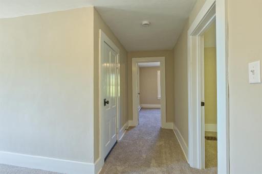 Hallway to both bedrooms.