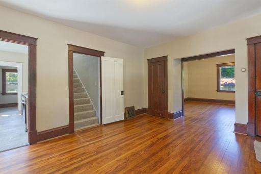 Original wood floors in dining room that flow into the living room