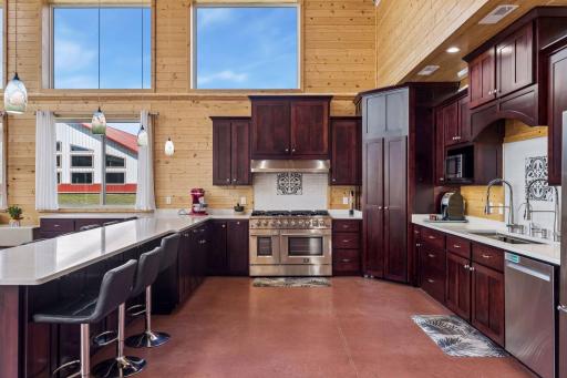 Plenty of space to prep, cook, and serve in this gorgeous and massive kitchen.