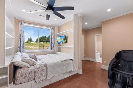 The spacious primary has built ins, a large en suite bathroom and a massive closet.