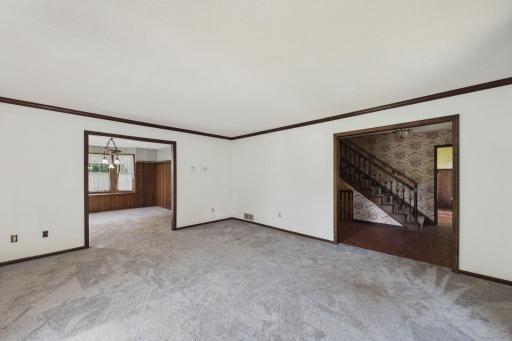 forma living room connects with formal dining room