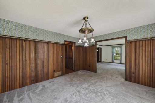 Formal dining room opens to formal living room