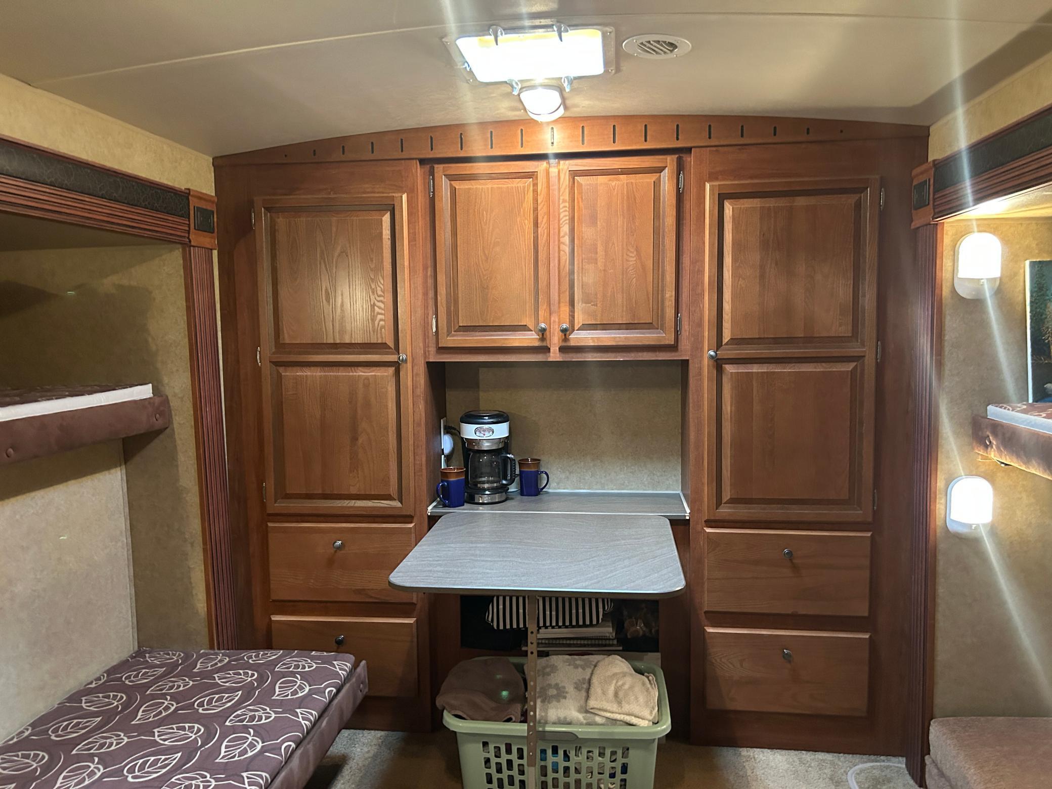 Back bedroom has double bunk beds and TONS of storage!