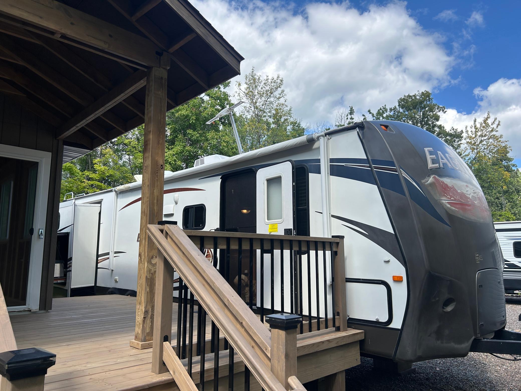 View entering deck to travel trailer entry door...