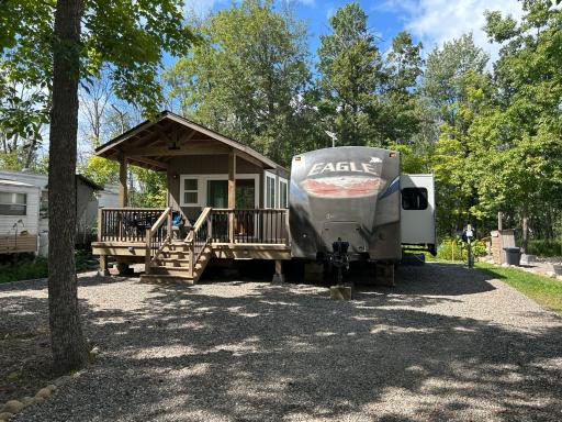 Fantastic perimeter lot in Sherwood Forest London Town! The 12 foot overhang covered porch is a treat you won't find much here!
