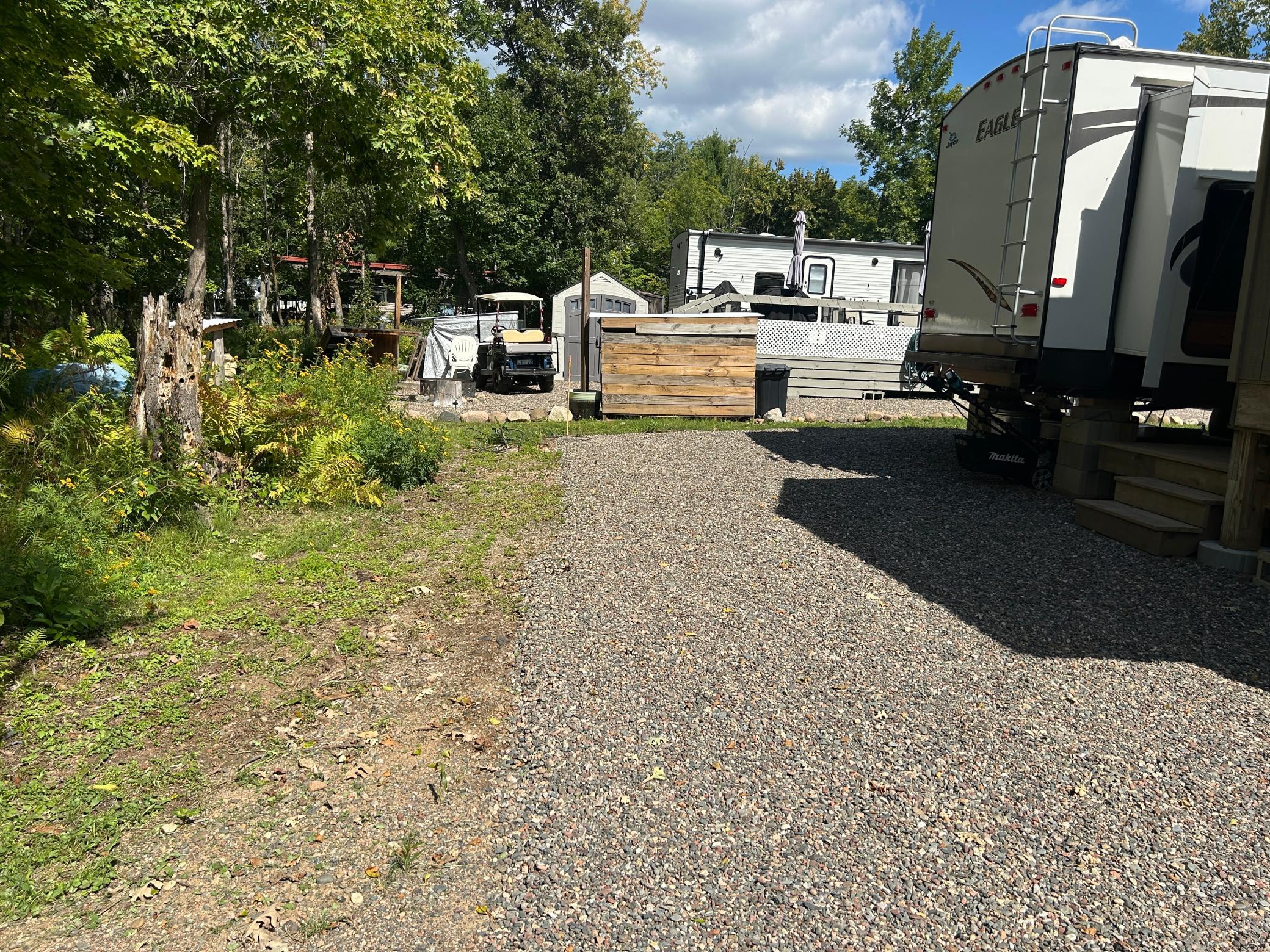 Back yard view up against the perimeter lot's association grounds "forest" space.