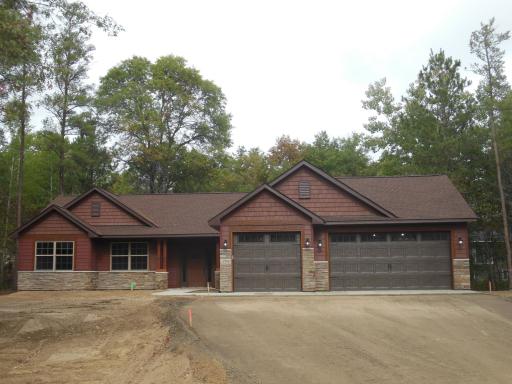 Front -- All Photos are of a similar home built at another location.
